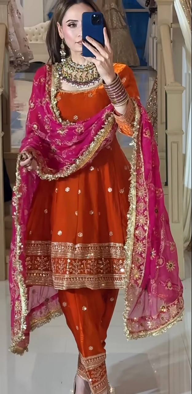 Glamorous Fusion: Celebrate in Stunning Attire - Image 3